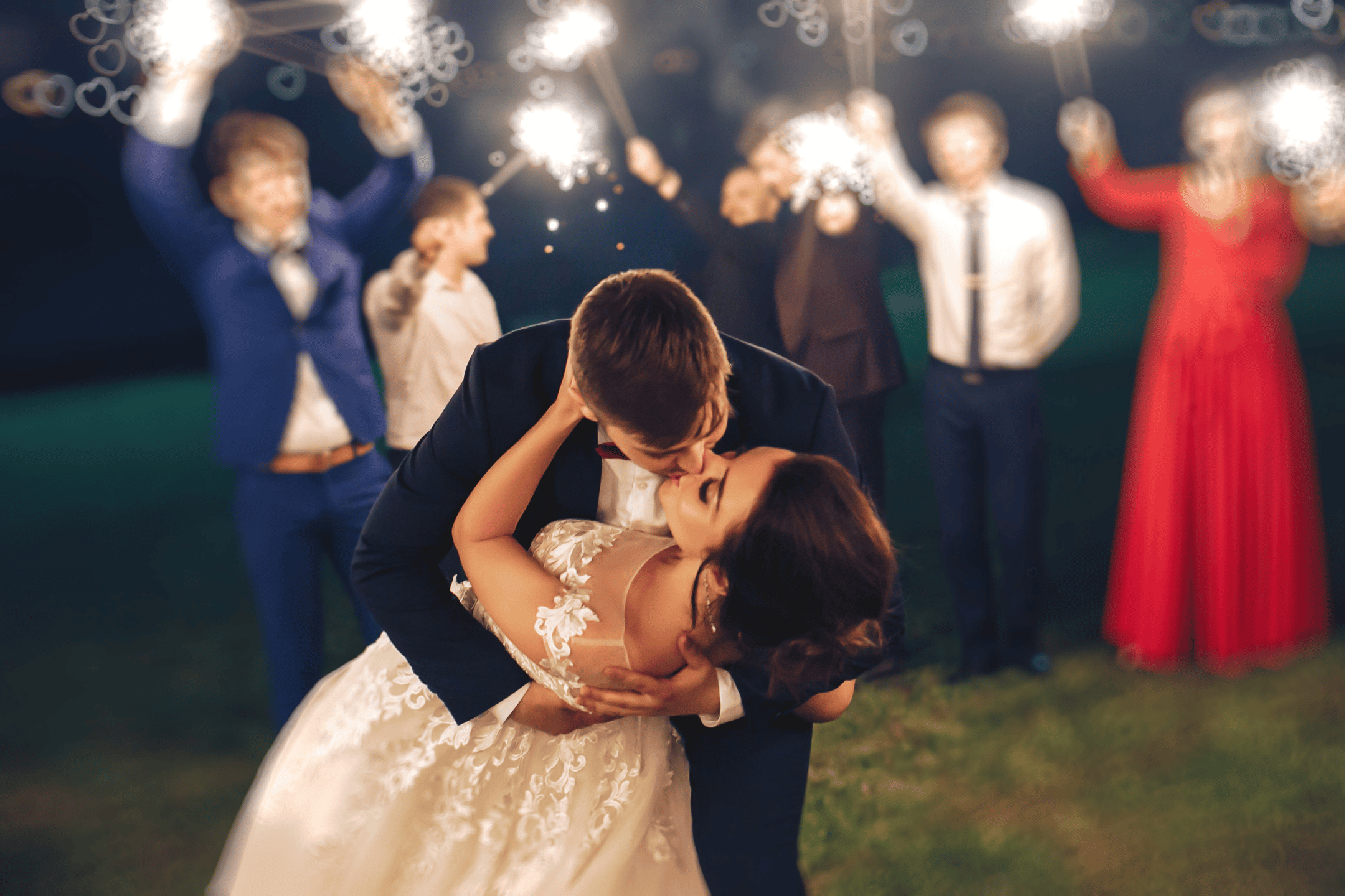 married couple sharing a kiss on the dance floor